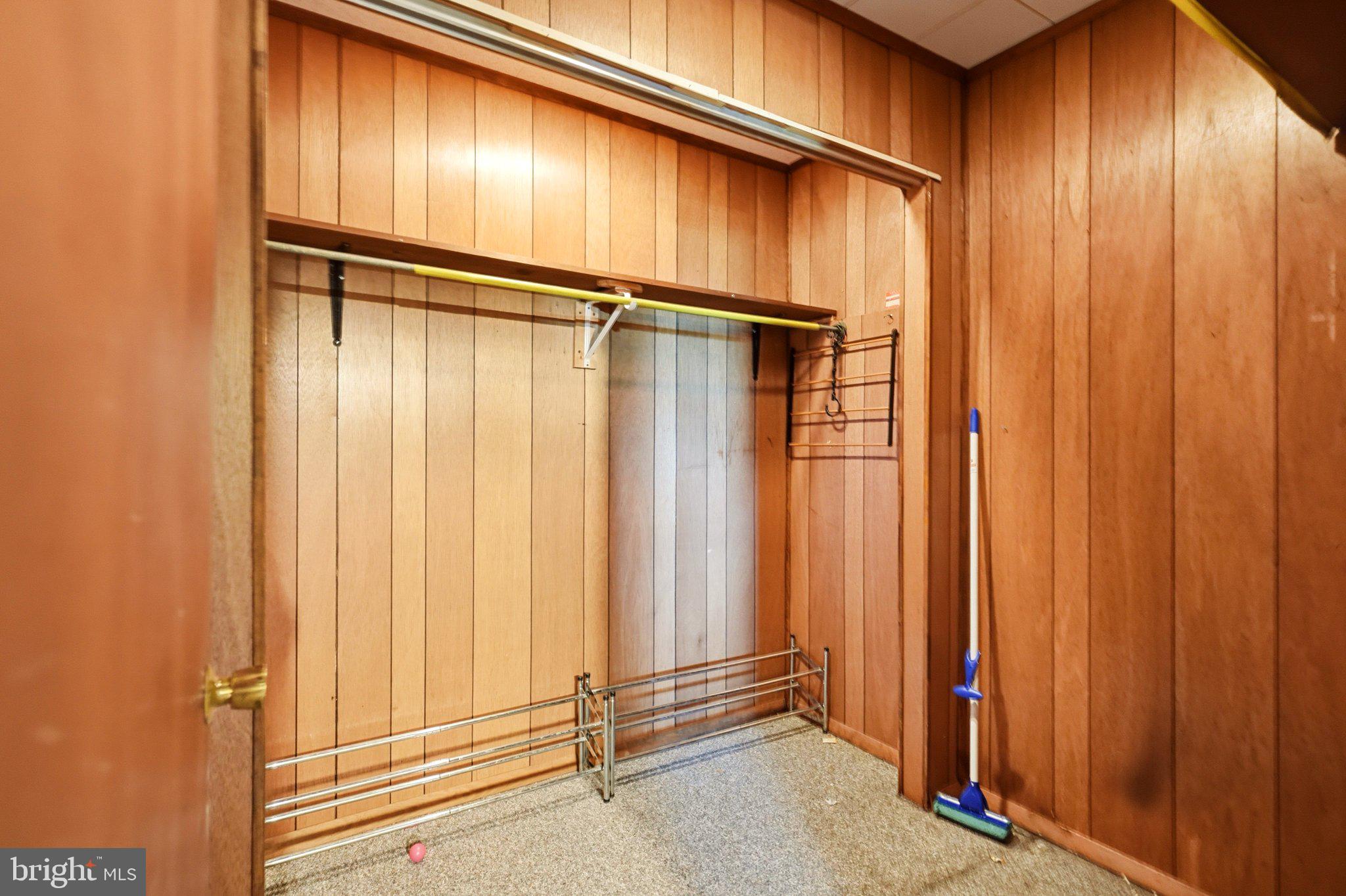 19 South Tilbury Road Salem, NJ 08079 - Photo 18 of 25 Spacious closet with wooden paneling.