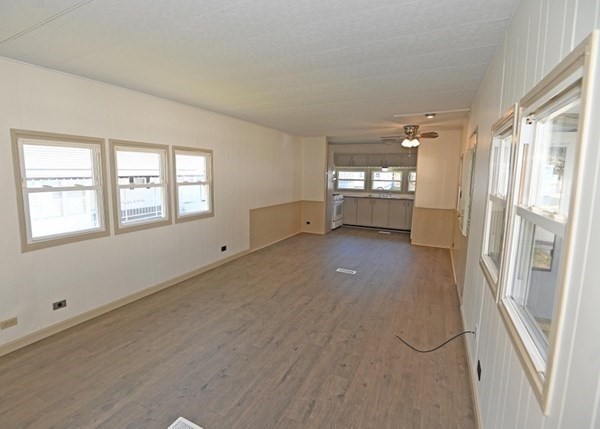 15 Clems Way Acushnet, MA 02743 - Photo 6 of 14 a view of livingroom with hardwood floor and window
