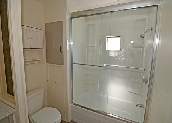 15 Clems Way Acushnet, MA 02743 - Photo 10 of 14 a bathroom with a shower and toilet