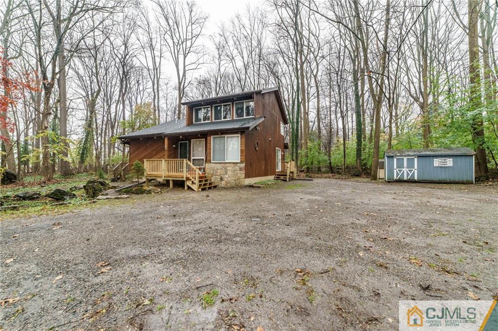 119 Foul Rift Road Belvidere, NJ 07823 - Photo 1 of 25 a front view of a house with a garden
