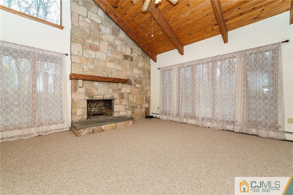 119 Foul Rift Road Belvidere, NJ 07823 - Photo 11 of 25 a view of an empty room with a fireplace