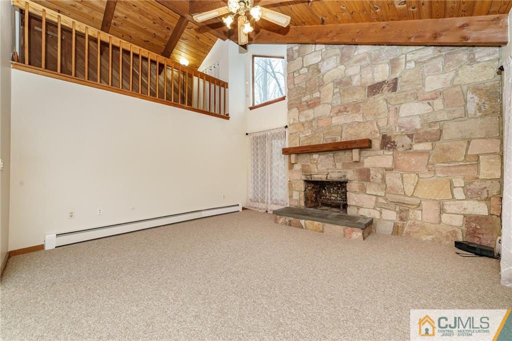 119 Foul Rift Road Belvidere, NJ 07823 - Photo 12 of 25 a view of an empty room with a fireplace