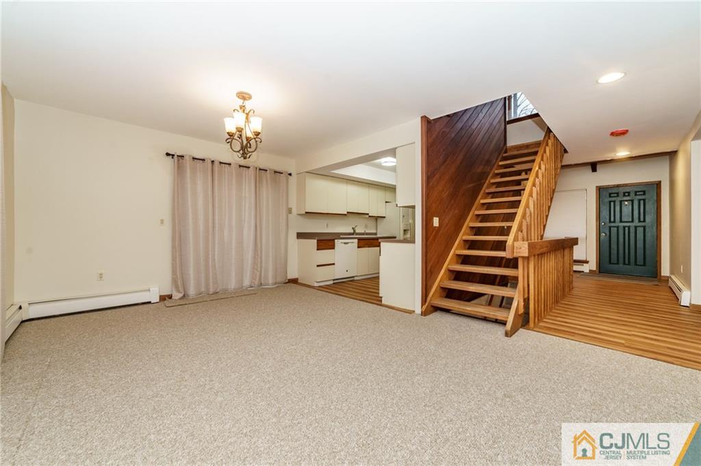 119 Foul Rift Road Belvidere, NJ 07823 - Photo 13 of 25 an empty room with wooden floor and white walls