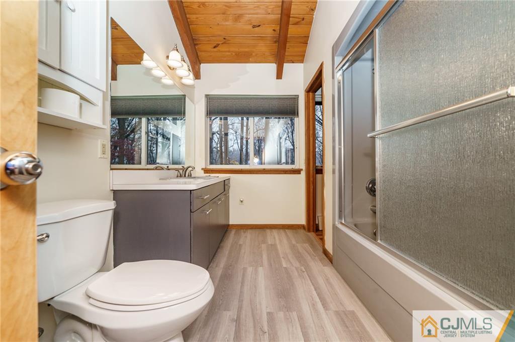 119 Foul Rift Road Belvidere, NJ 07823 - Photo 22 of 25 a bathroom with a toilet a sink and a window