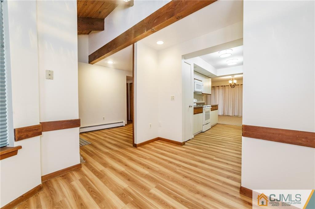 119 Foul Rift Road Belvidere, NJ 07823 - Photo 4 of 25 a view of an empty room and wooden floor