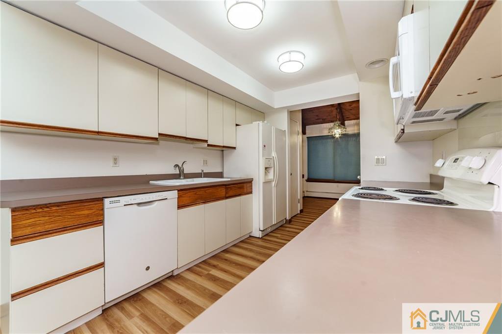 119 Foul Rift Road Belvidere, NJ 07823 - Photo 5 of 25 a kitchen with granite countertop a sink and cabinets
