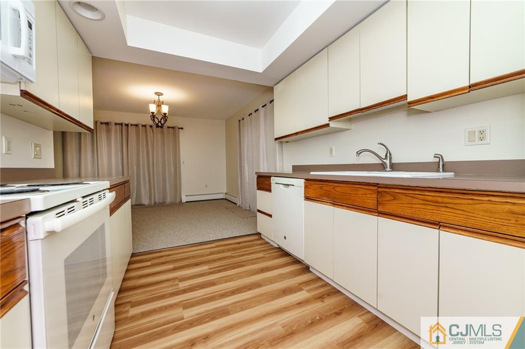 119 Foul Rift Road Belvidere, NJ 07823 - Photo 6 of 25 a view of a kitchen with a sink and cabinets