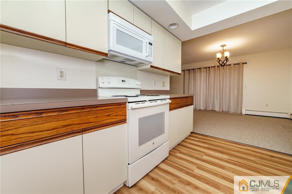 119 Foul Rift Road Belvidere, NJ 07823 - Photo 7 of 25 a kitchen with stainless steel appliances granite countertop a sink and cabinets