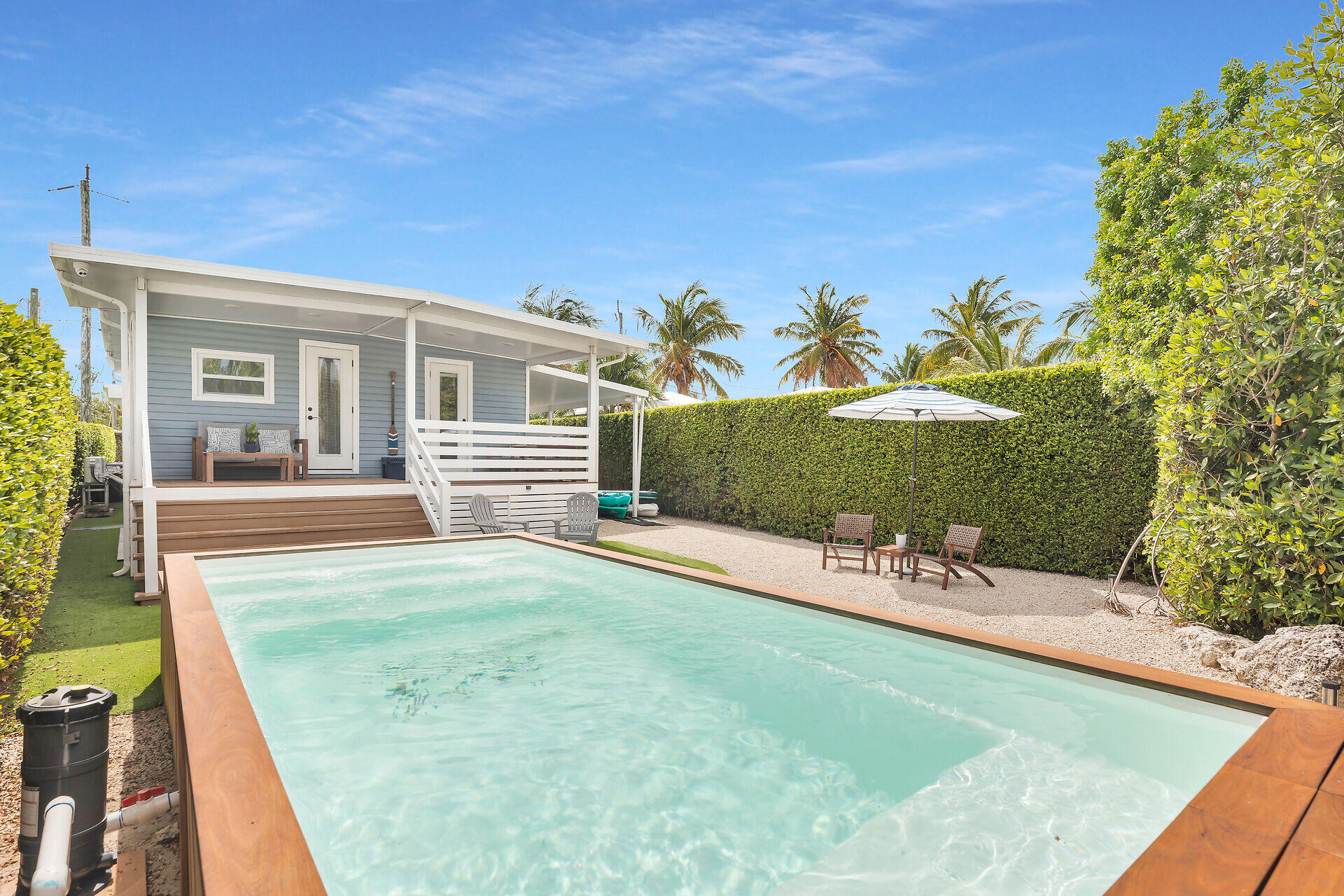 553 Oldsmar Lane Key Largo, FL 33037 - Photo 12 of 48 swimming pool view with a seating space