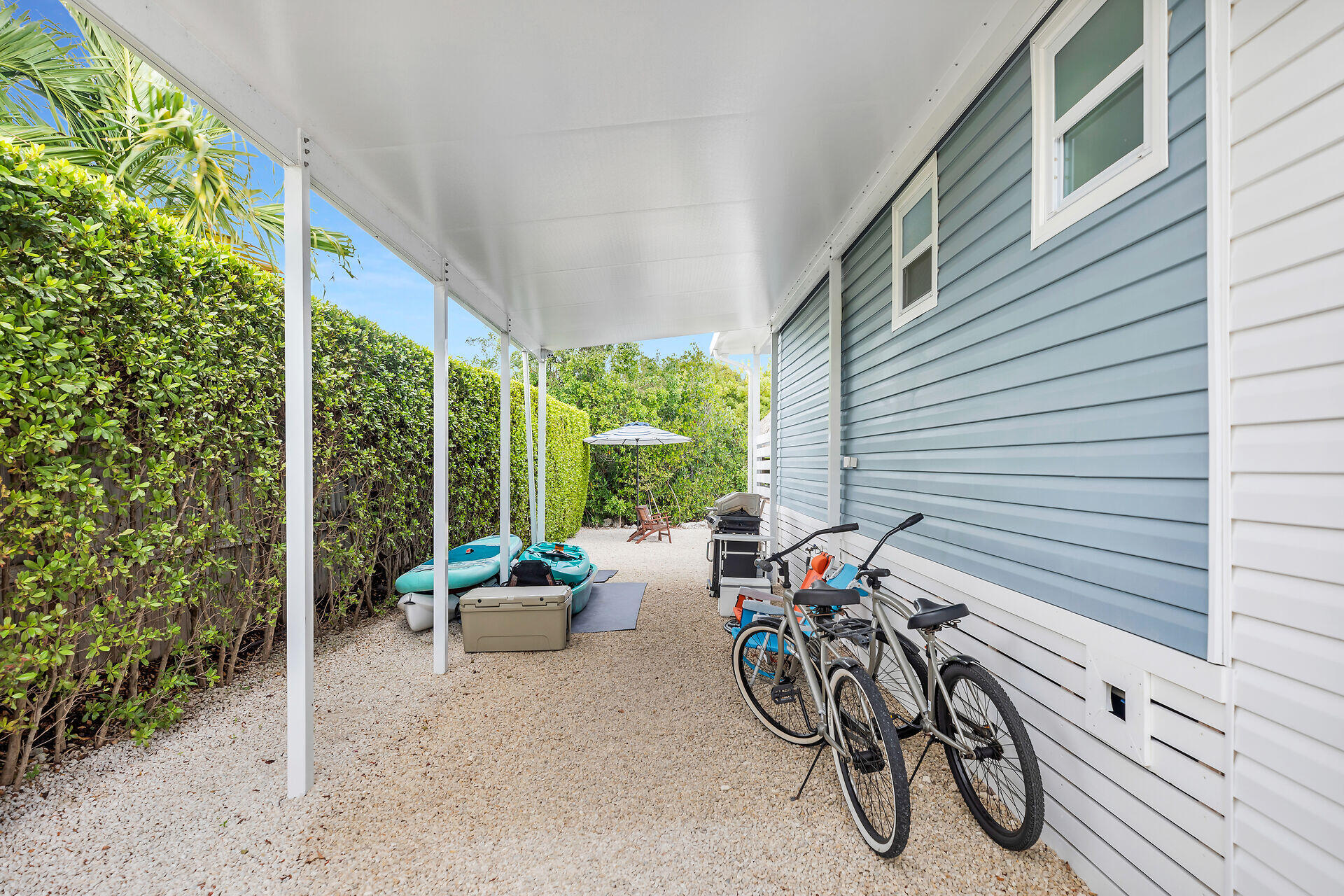 553 Oldsmar Lane Key Largo, FL 33037 - Photo 17 of 48 a view of a patio with chairs and table in a patio