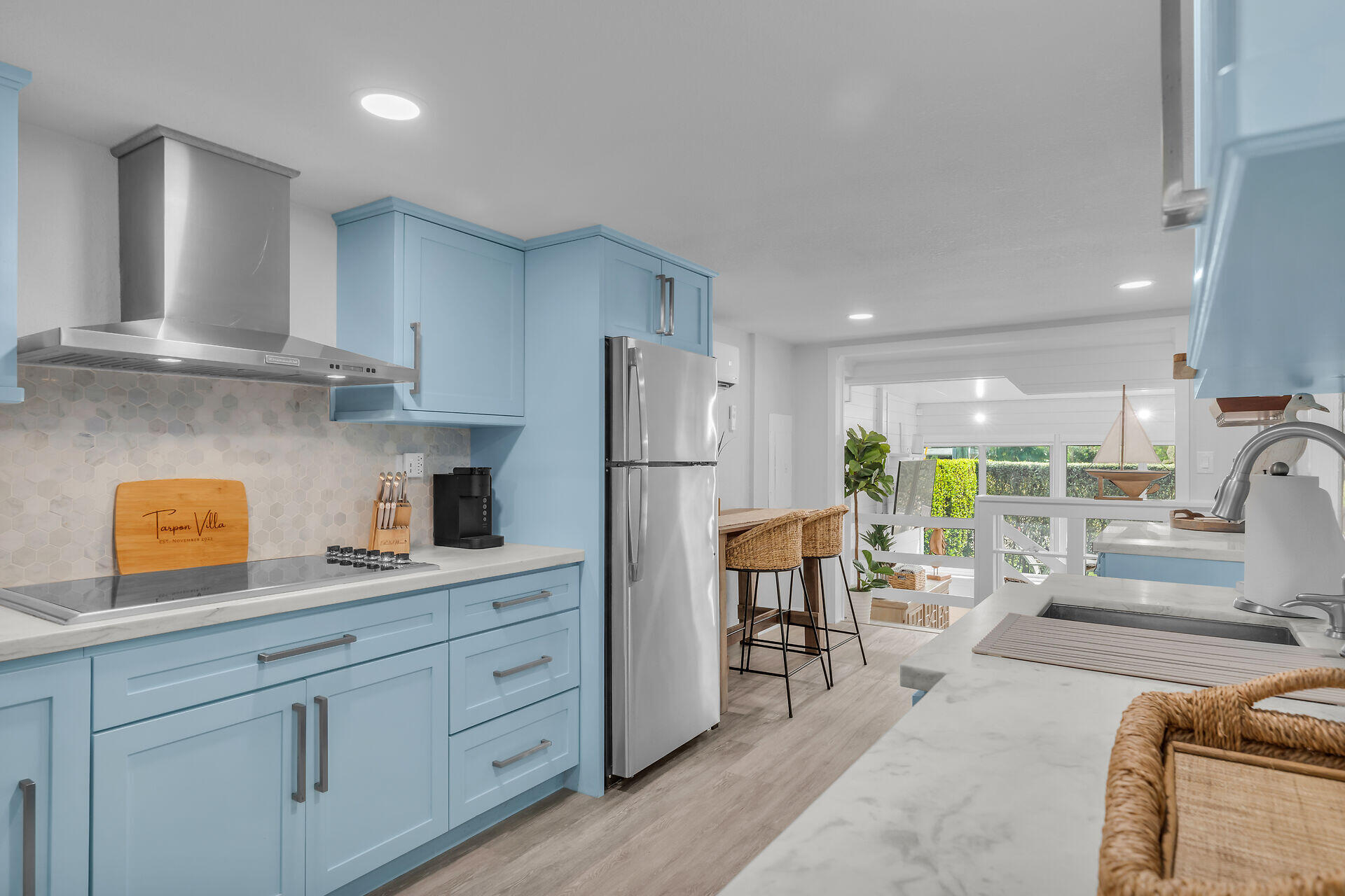 553 Oldsmar Lane Key Largo, FL 33037 - Photo 32 of 48 a kitchen with stainless steel appliances granite countertop a refrigerator and a stove top oven