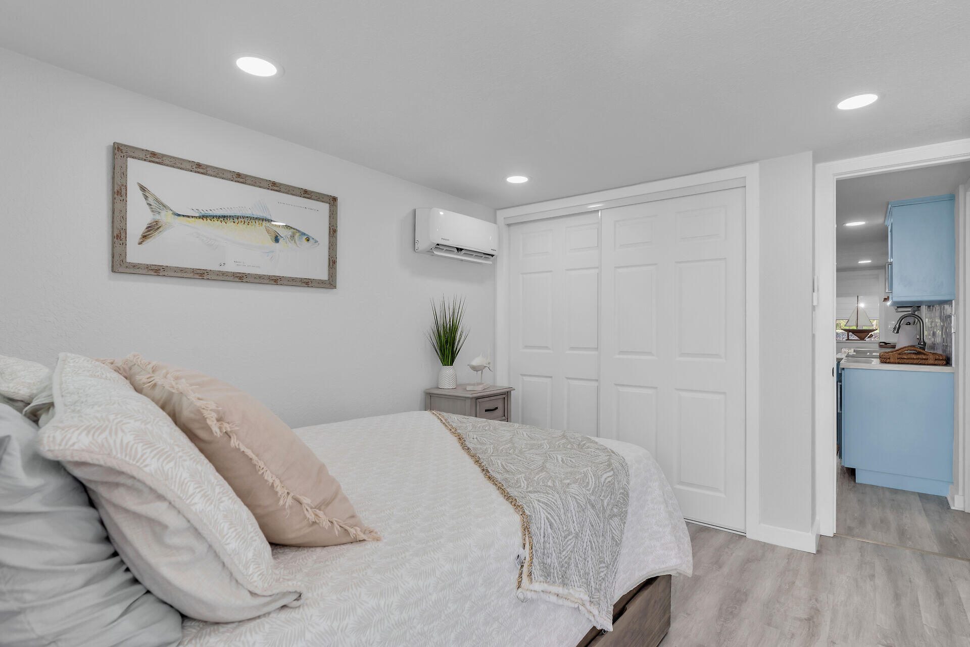 553 Oldsmar Lane Key Largo, FL 33037 - Photo 38 of 48 a bedroom with a bed and a view of kitchen