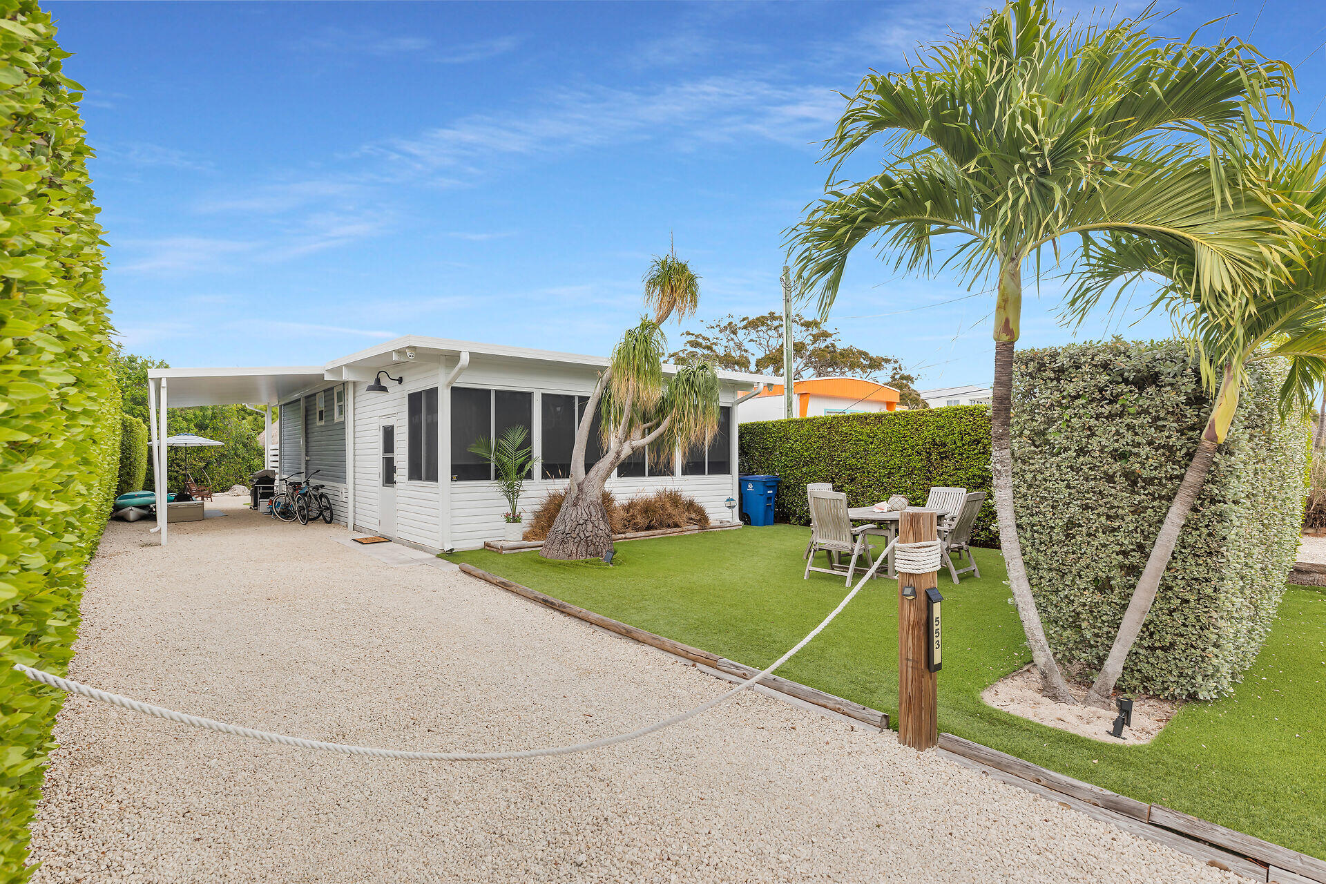 553 Oldsmar Lane Key Largo, FL 33037 - Photo 4 of 48 a view of a house with a patio