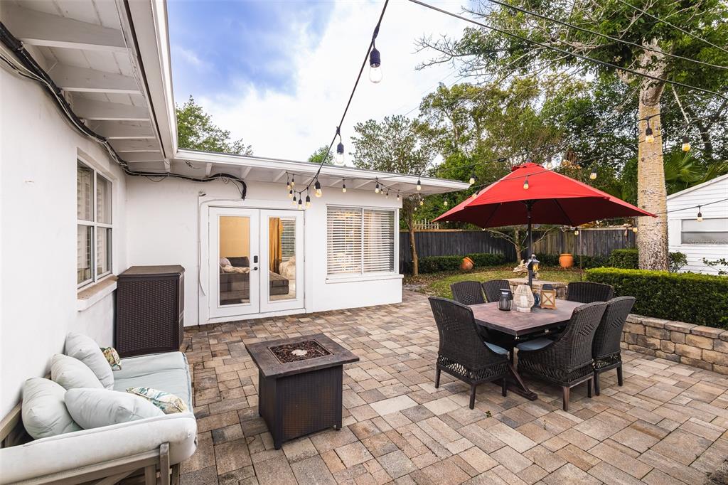 1001 Nottingham Street Orlando, FL 32803 - Photo 34 of 49 a patio with patio a couch and chairs