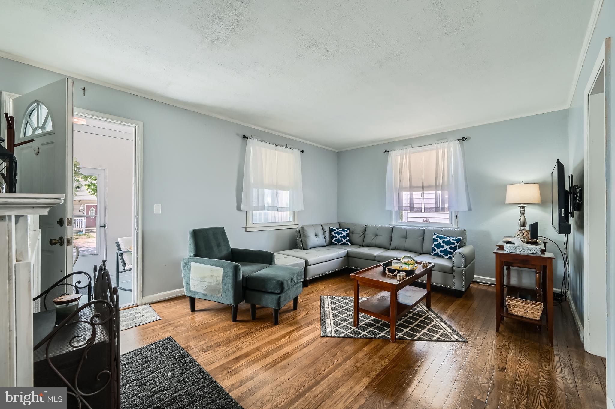 1905 Jackson Road Baltimore, MD 21222 - Photo 7 of 28 a living room with furniture and a wooden floor
