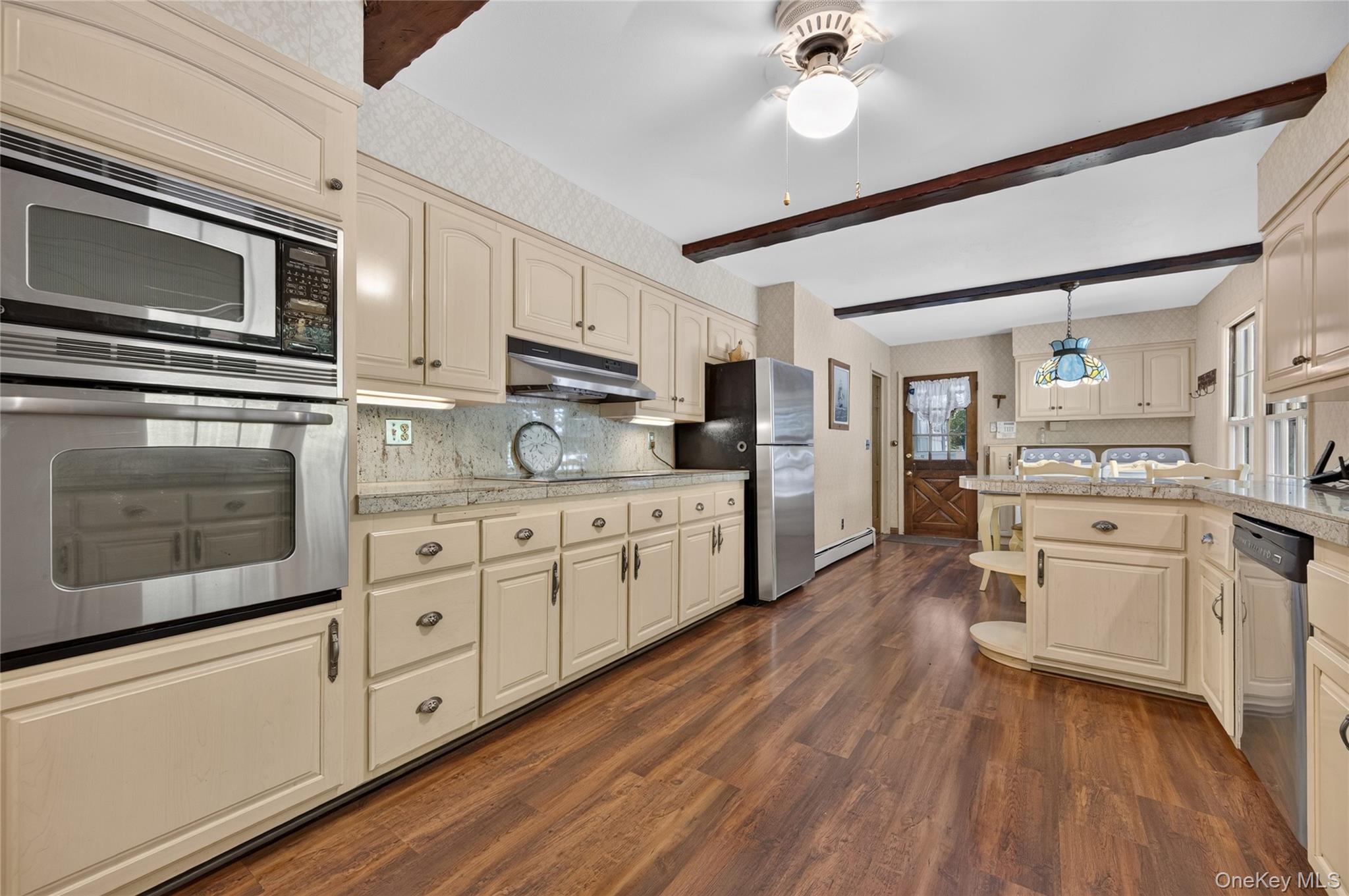 325 Birch Hill Road Locust Valley, NY 11560 - Photo 9 of 18 Kitchen with Stainless Steel Appliances