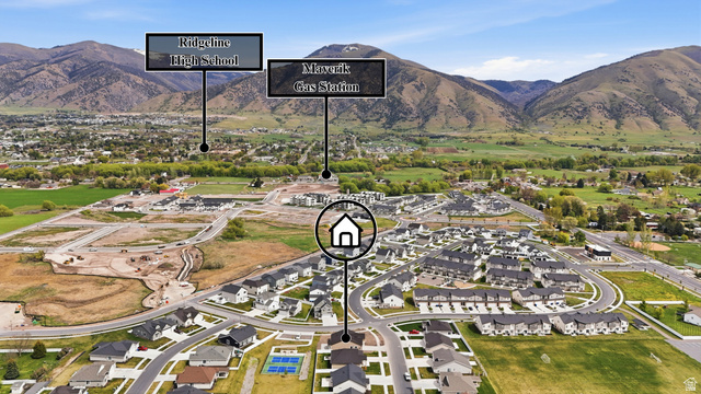 401 West 3085 South, Unit 329 Nibley, UT 84321 - Photo 10 of 34 View of property location featuring a mountainous background and nearby suburban area