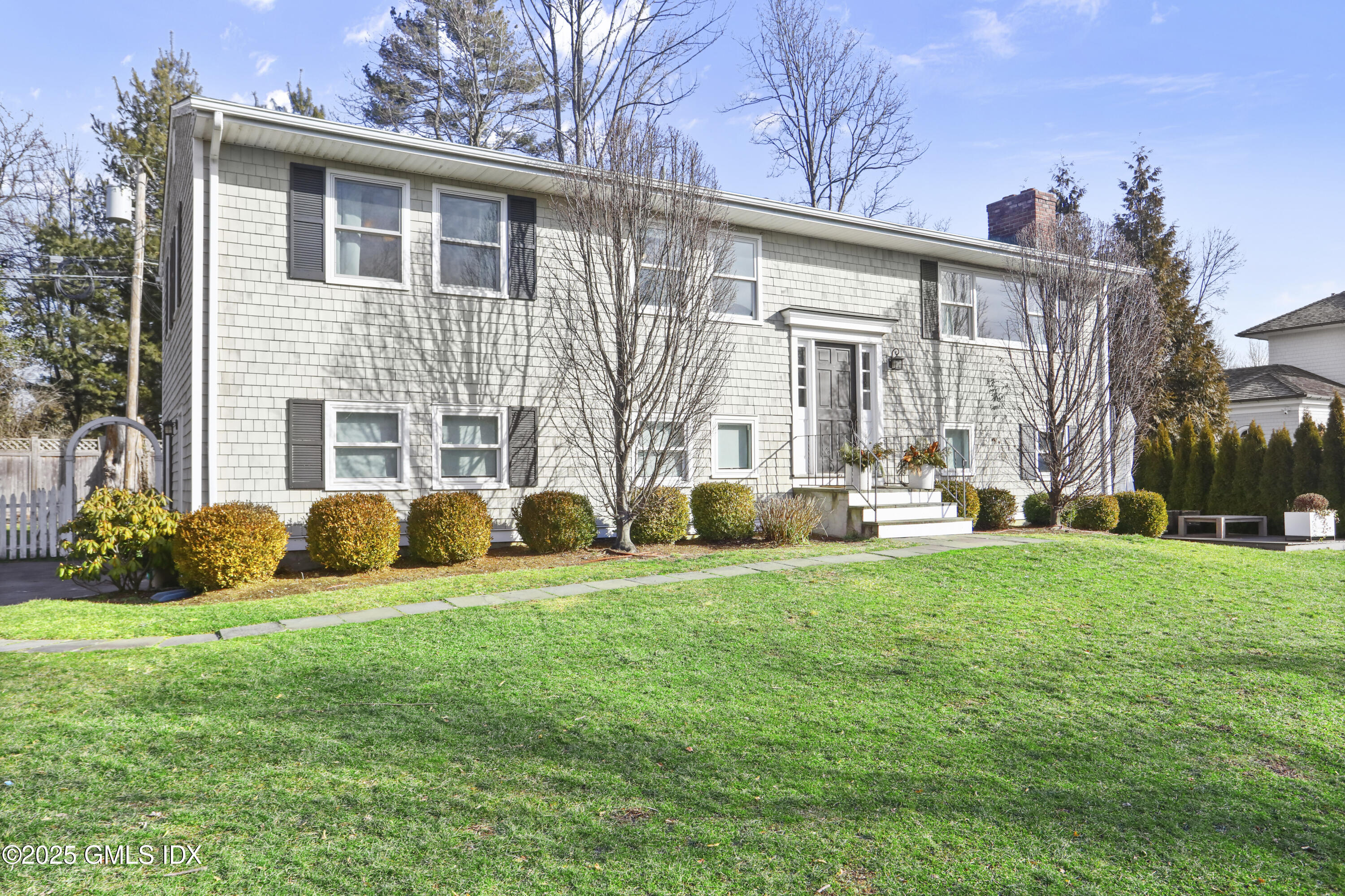 6 Meadowbank Road Old Greenwich, CT 06870 - Photo 24 of 30 a view of a house with backyard and porch