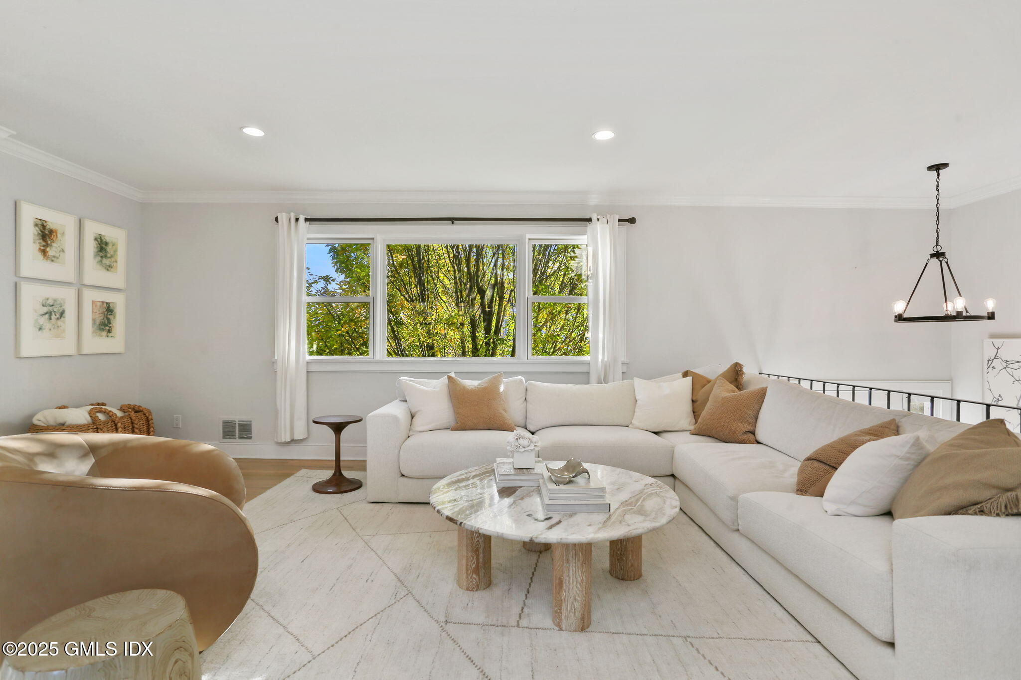 6 Meadowbank Road Old Greenwich, CT 06870 - Photo 6 of 30 a living room with furniture and a large window