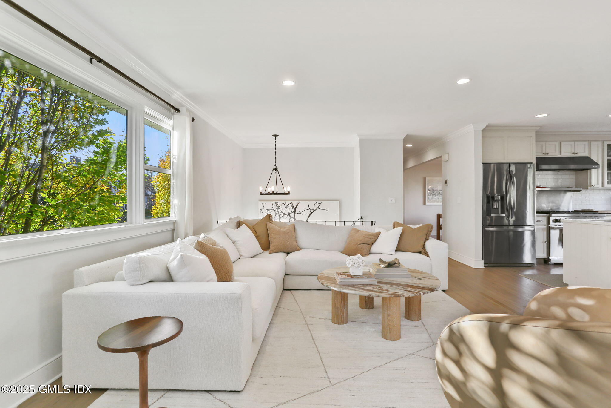 6 Meadowbank Road Old Greenwich, CT 06870 - Photo 9 of 30 a living room with furniture and a large window