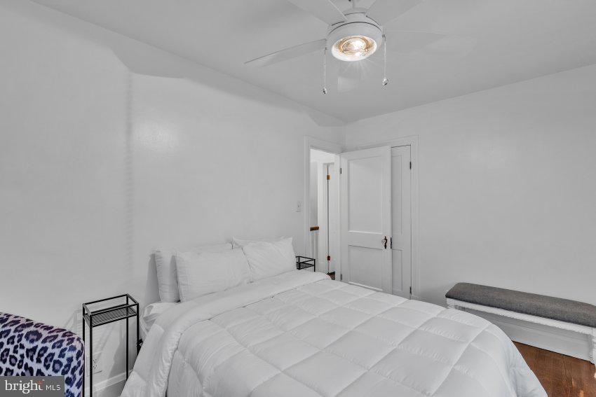 3310 Elbert Street Baltimore, MD 21229 - Photo 21 of 23 a bedroom with a bed and a window