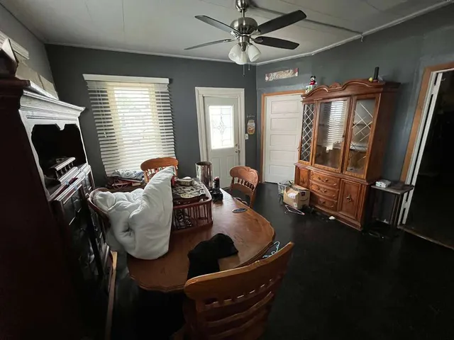 a room with furniture and a window