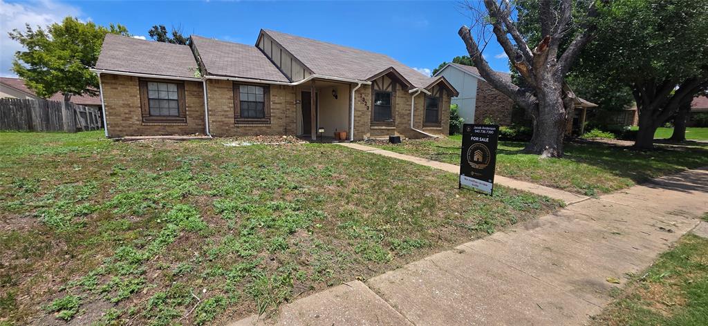 1323 Timberview Drive Allen, TX 75002 - Photo 2 of 14 Single-story brick exterior with a gabled roofline