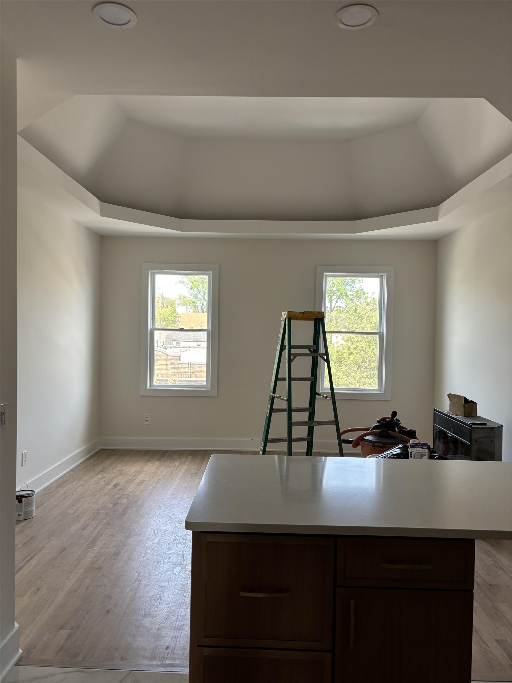 802 Broadway, Unit 3R Bayonne, NJ 07002 - Photo 2 of 8 a view of a room with a window and wooden floor