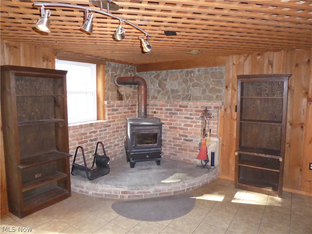 9979 Wilson Mills Road Chardon, OH 44024 - Photo 22 of 35 Close Up View of the Hearth and Woodburner and Accent Lighting!