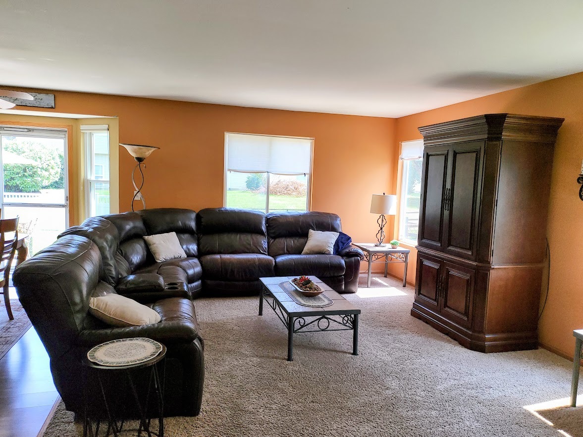 156 Sycamore Drive Bolingbrook, IL 60490 - Photo 11 of 26 a living room with furniture and a window