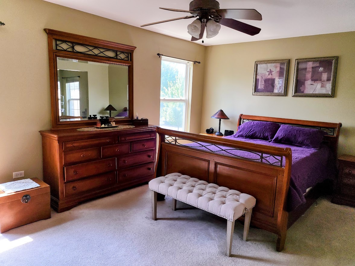 156 Sycamore Drive Bolingbrook, IL 60490 - Photo 15 of 26 a reading room with wooden floors and furniture