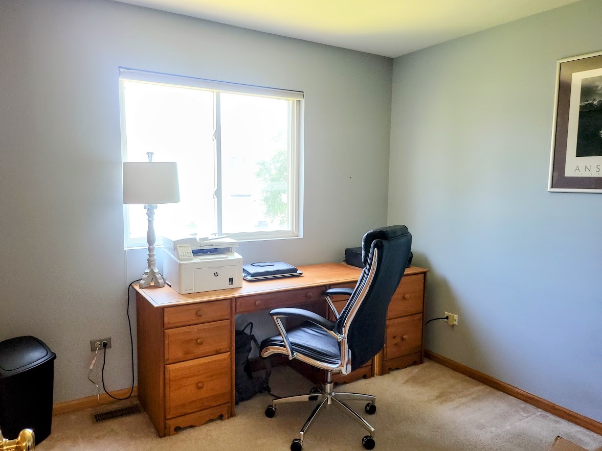 156 Sycamore Drive Bolingbrook, IL 60490 - Photo 22 of 26 a view of a workspace with furniture and a window