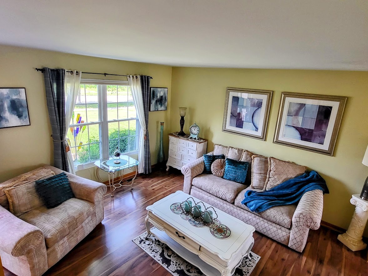 156 Sycamore Drive Bolingbrook, IL 60490 - Photo 3 of 26 a living room with furniture and a window