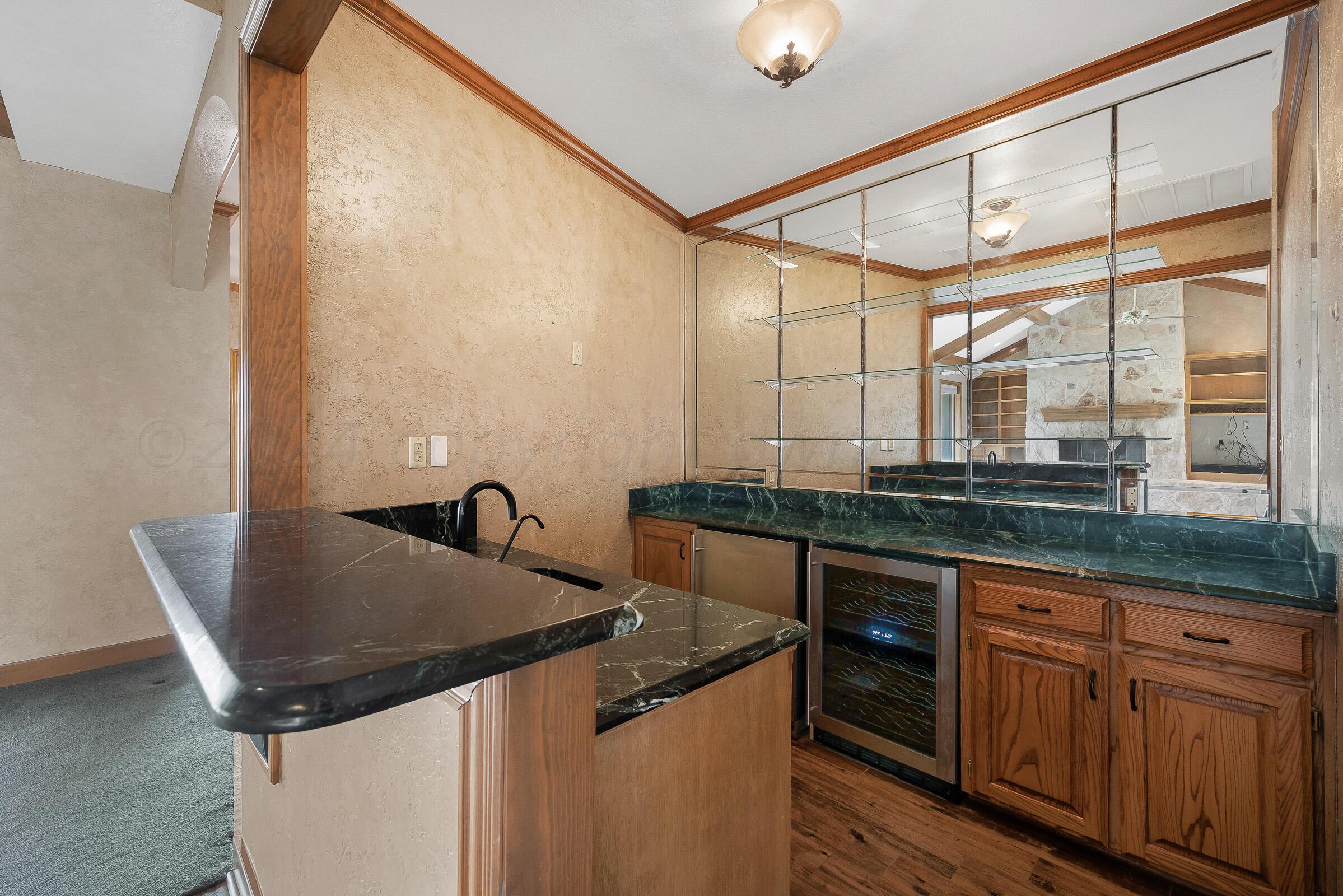37 Citadel Drive Amarillo, TX 79124 - Photo 12 of 56 012_Wet Bar, Wine Fridge and Mini Fridge