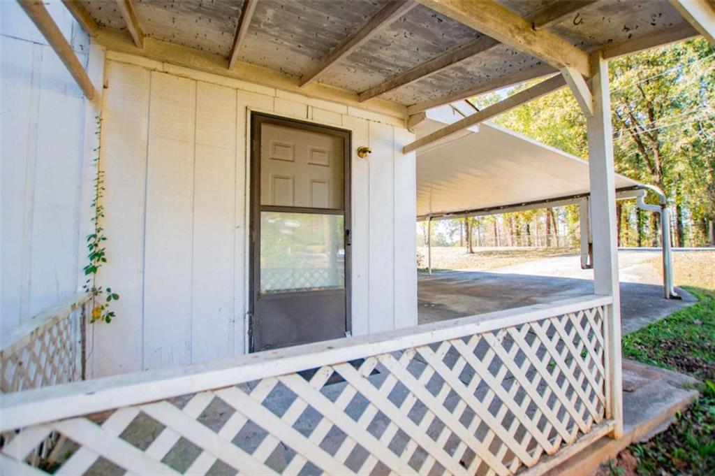 7104 Miller Street Lithia Springs, GA 30122 - Photo 15 of 18 a view of a porch