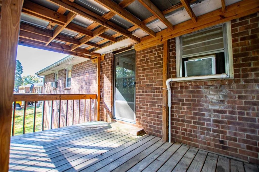 7104 Miller Street Lithia Springs, GA 30122 - Photo 16 of 18 a view of outdoor space with wooden deck