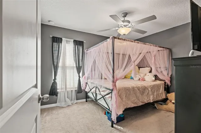 a room with furniture and mirror