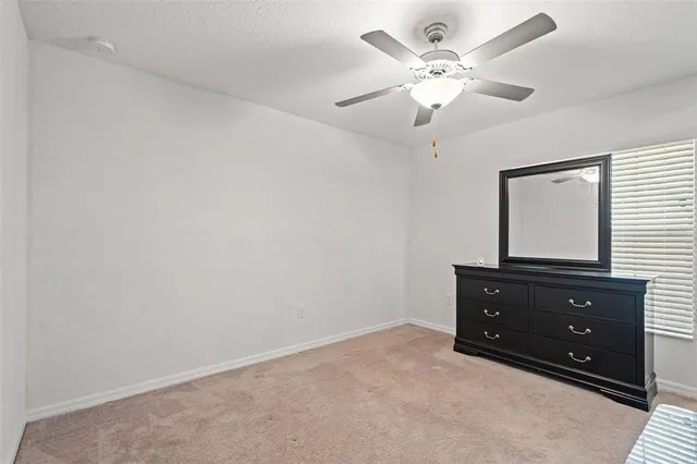 an aerial view of residential building and parking space
