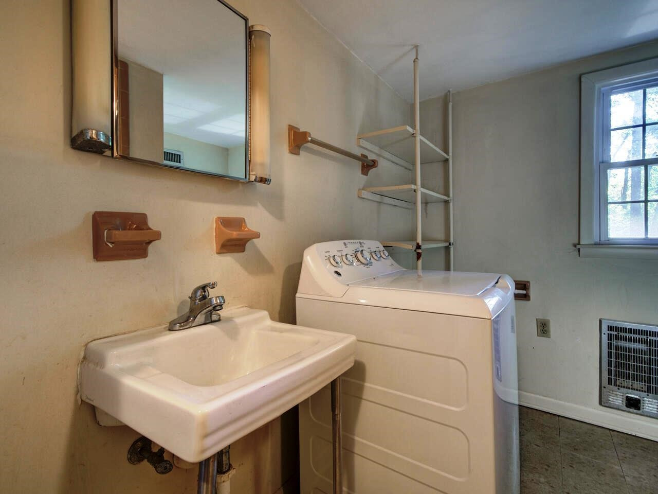 1305 Kingston Ridge Road Cary, NC 27511 - Photo 22 of 30 Lower Level Bath and Laundry room combined Bath/Laundry
