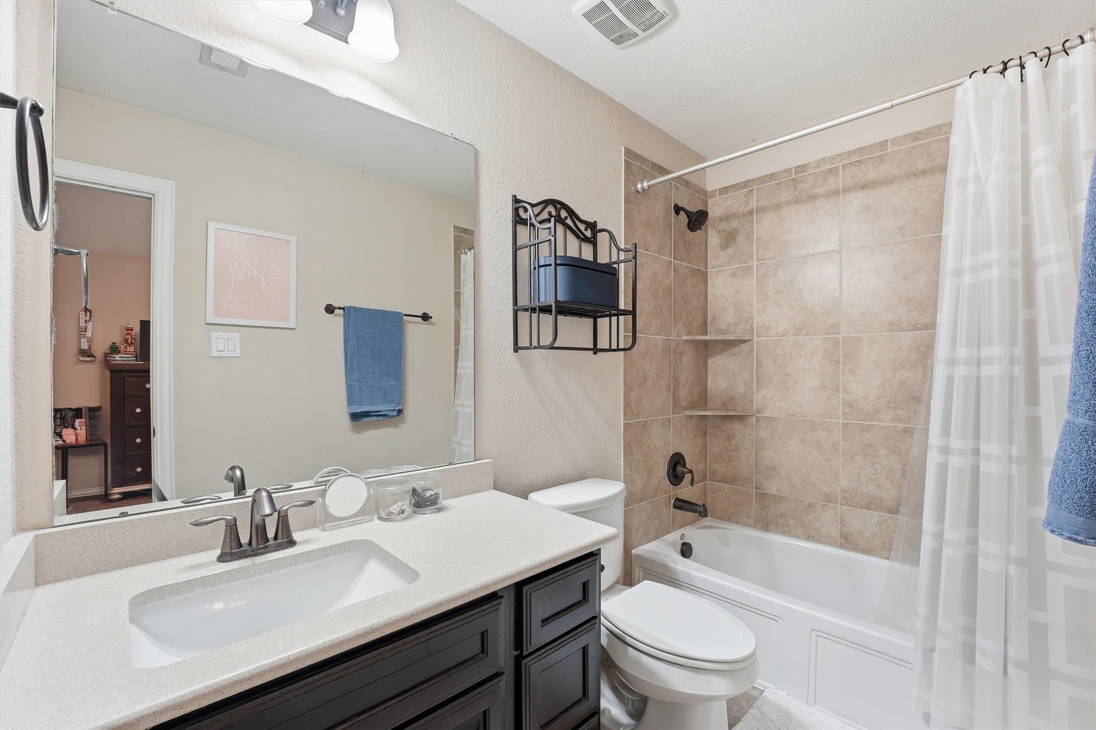 12506 Northpointe Ridge Lane Tomball, TX 77377 - Photo 25 of 31 a bathroom with a sink a toilet and a large mirror