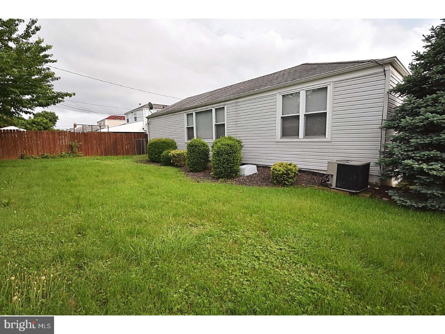 1131 Layton Road Philadelphia, PA 19115 - Photo 22 of 24 a view of a house with backyard and garden