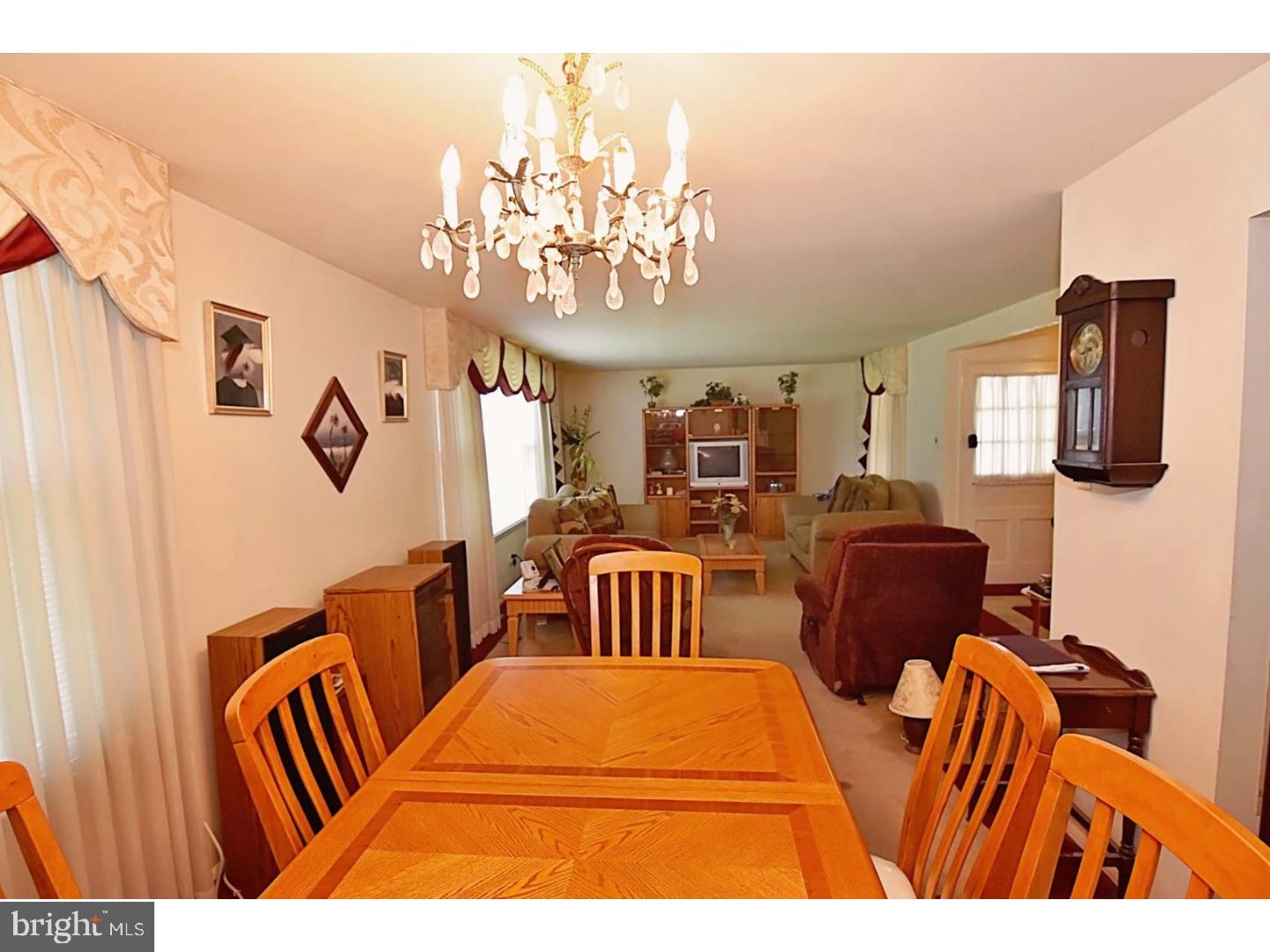 1131 Layton Road Philadelphia, PA 19115 - Photo 8 of 24 a bedroom with furniture and wooden floor