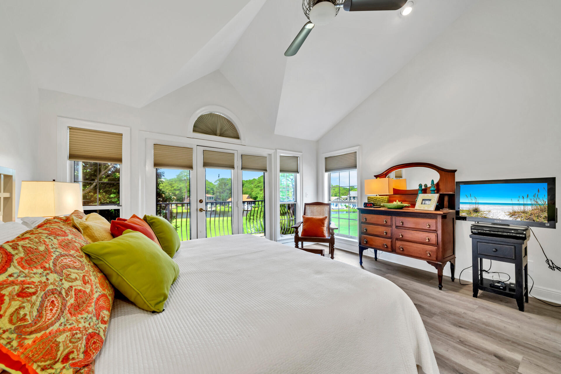 64 Vantage Point, Unit 64 Miramar Beach, FL 32550 - Photo 20 of 38 a bedroom with furniture and a large window