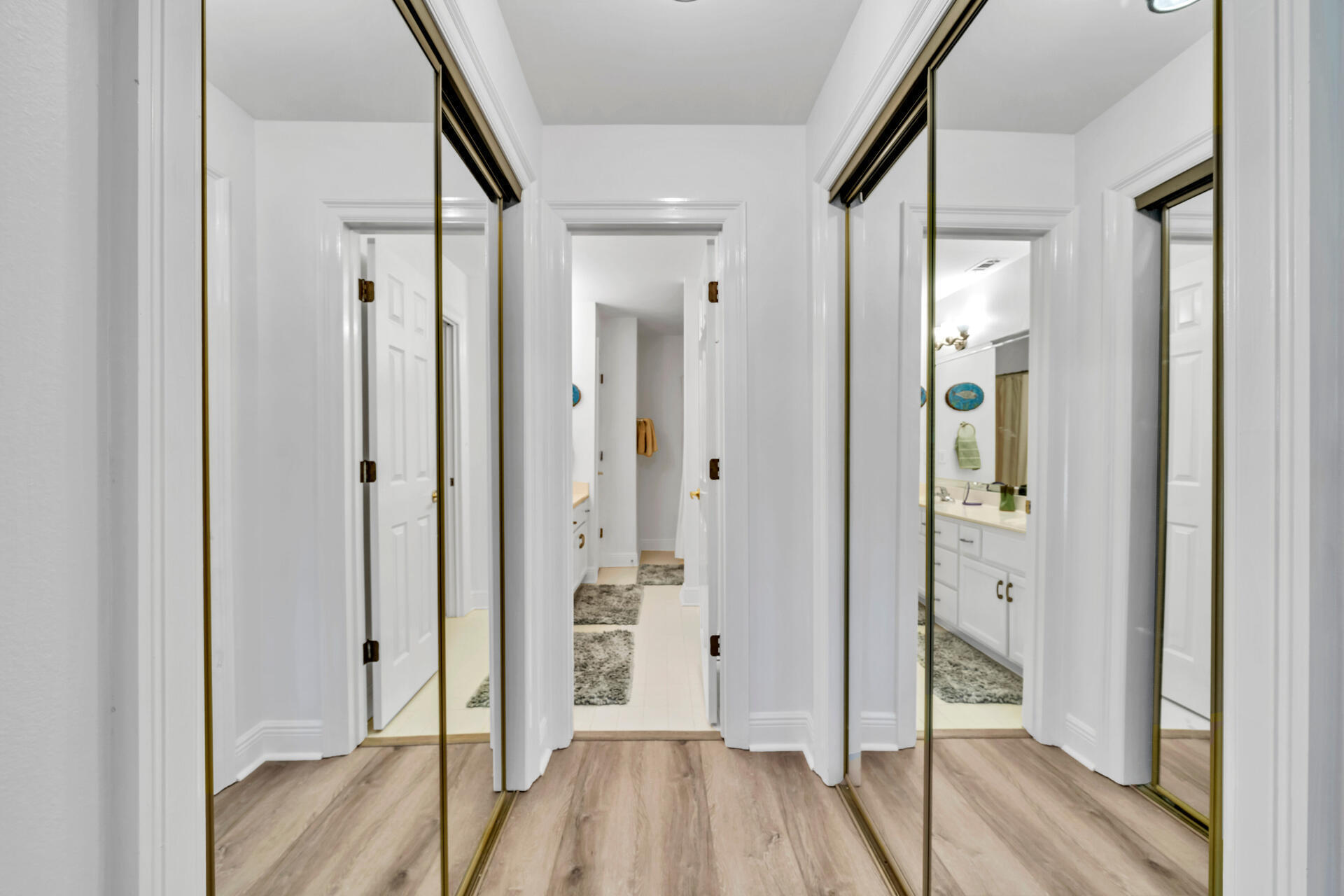 64 Vantage Point, Unit 64 Miramar Beach, FL 32550 - Photo 25 of 38 a view of hallway with wooden floor