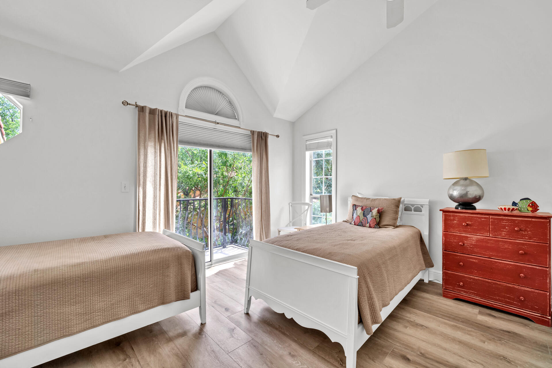 64 Vantage Point, Unit 64 Miramar Beach, FL 32550 - Photo 26 of 38 a bedroom with a large bed and a window