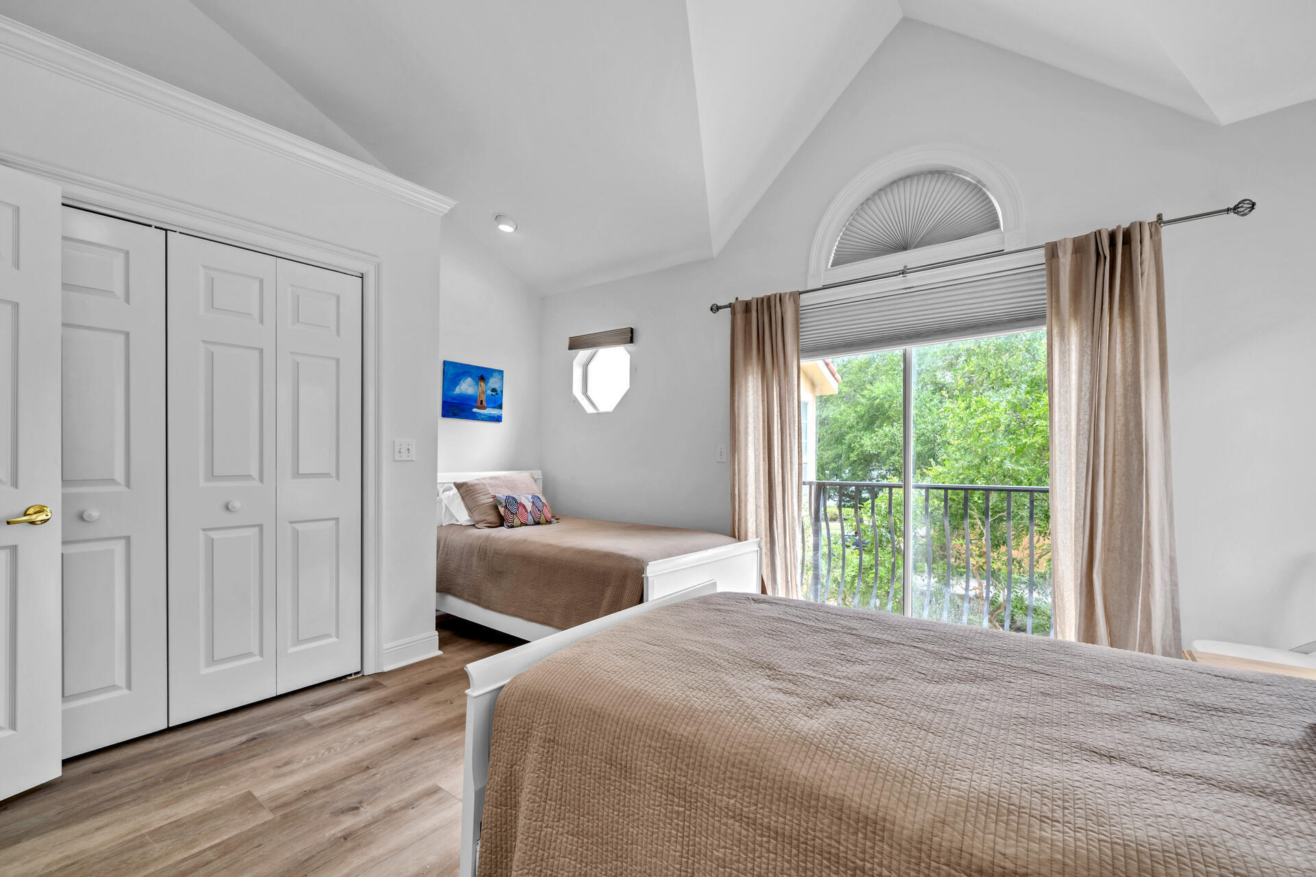 64 Vantage Point, Unit 64 Miramar Beach, FL 32550 - Photo 27 of 38 a bedroom with two beds and a large window