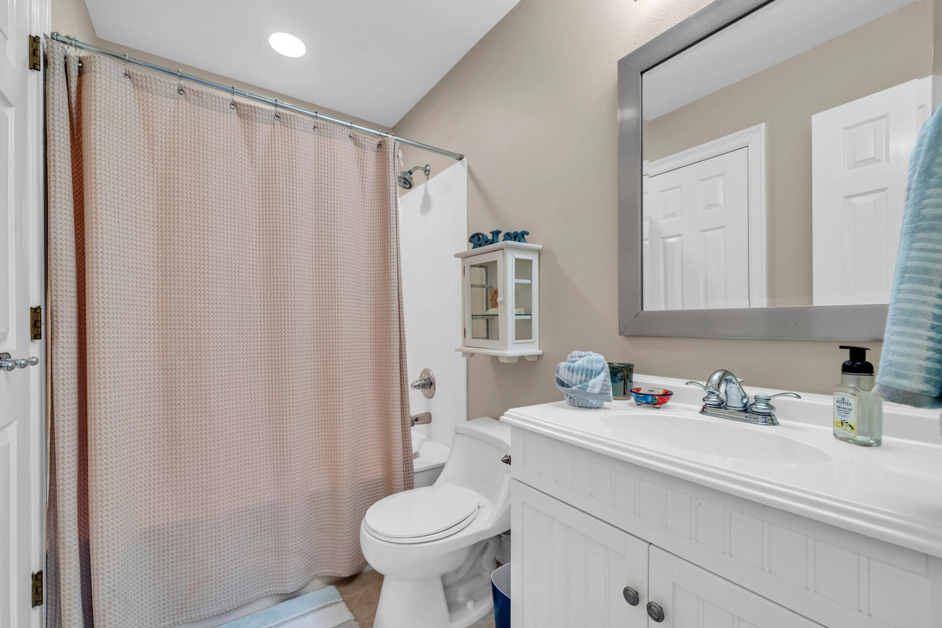 64 Vantage Point, Unit 64 Miramar Beach, FL 32550 - Photo 28 of 38 a bathroom with a sink toilet and shower