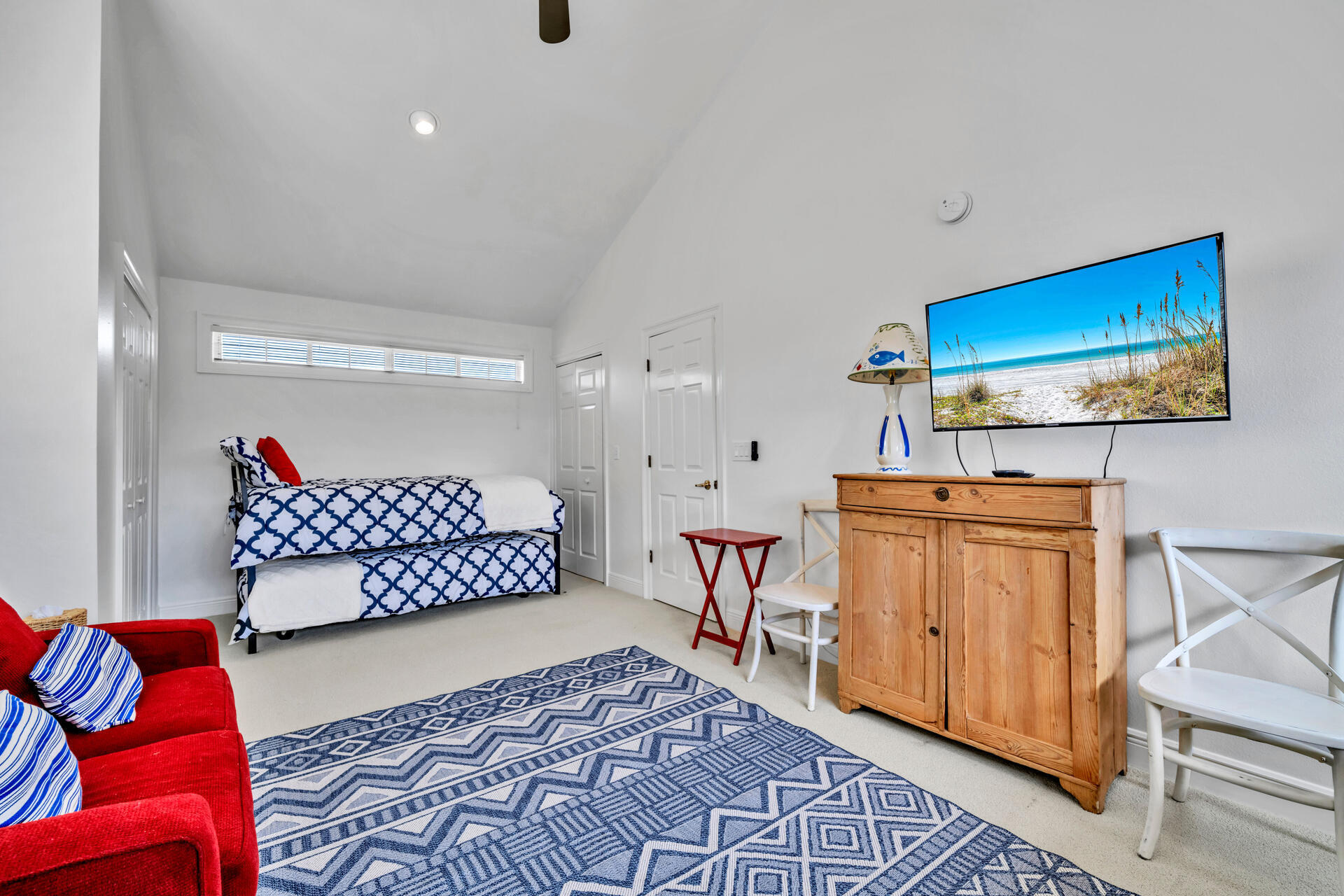 64 Vantage Point, Unit 64 Miramar Beach, FL 32550 - Photo 31 of 38 a bedroom with a bed and wooden floor