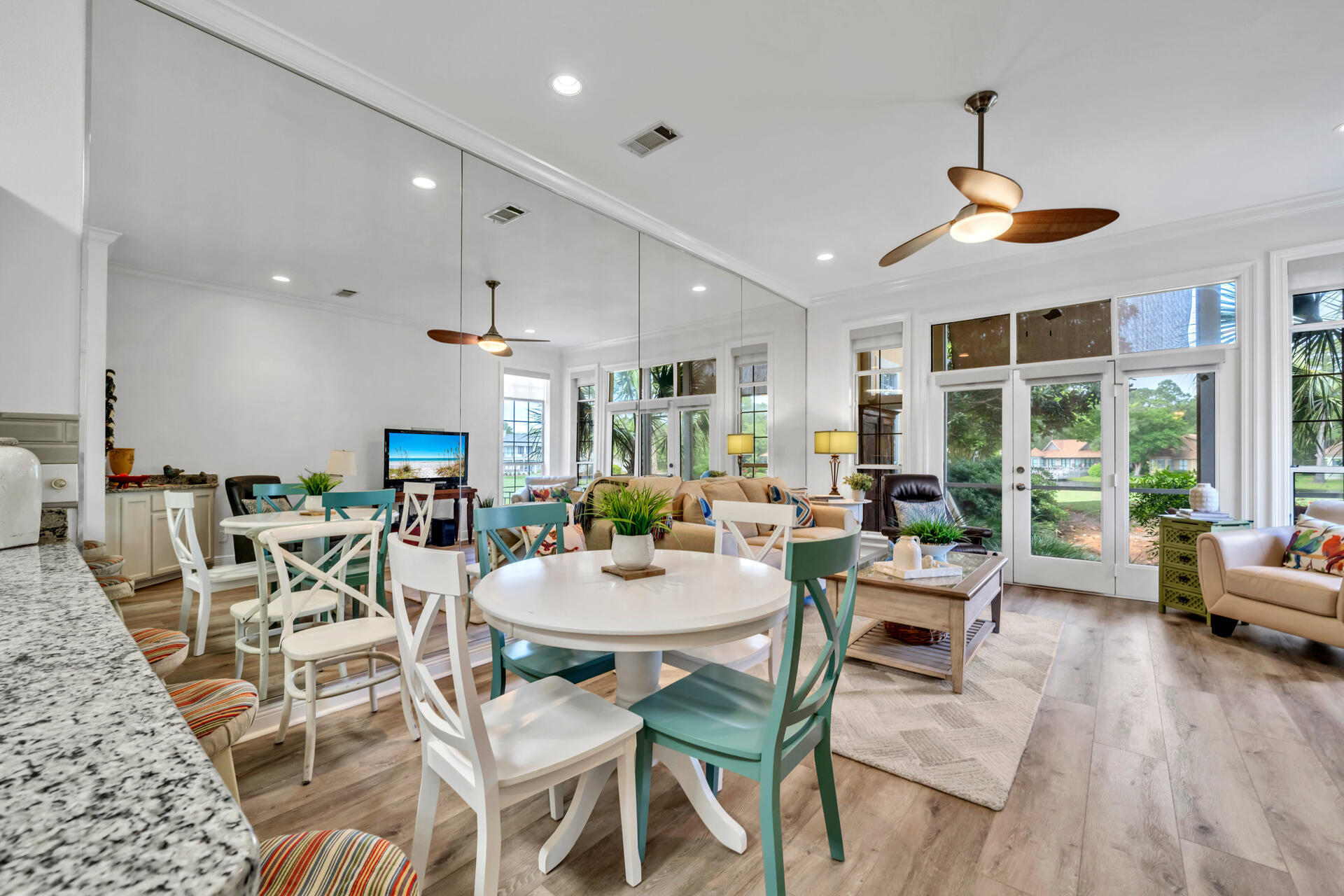 64 Vantage Point, Unit 64 Miramar Beach, FL 32550 - Photo 7 of 38 a view of a dining room with furniture window and wooden floor