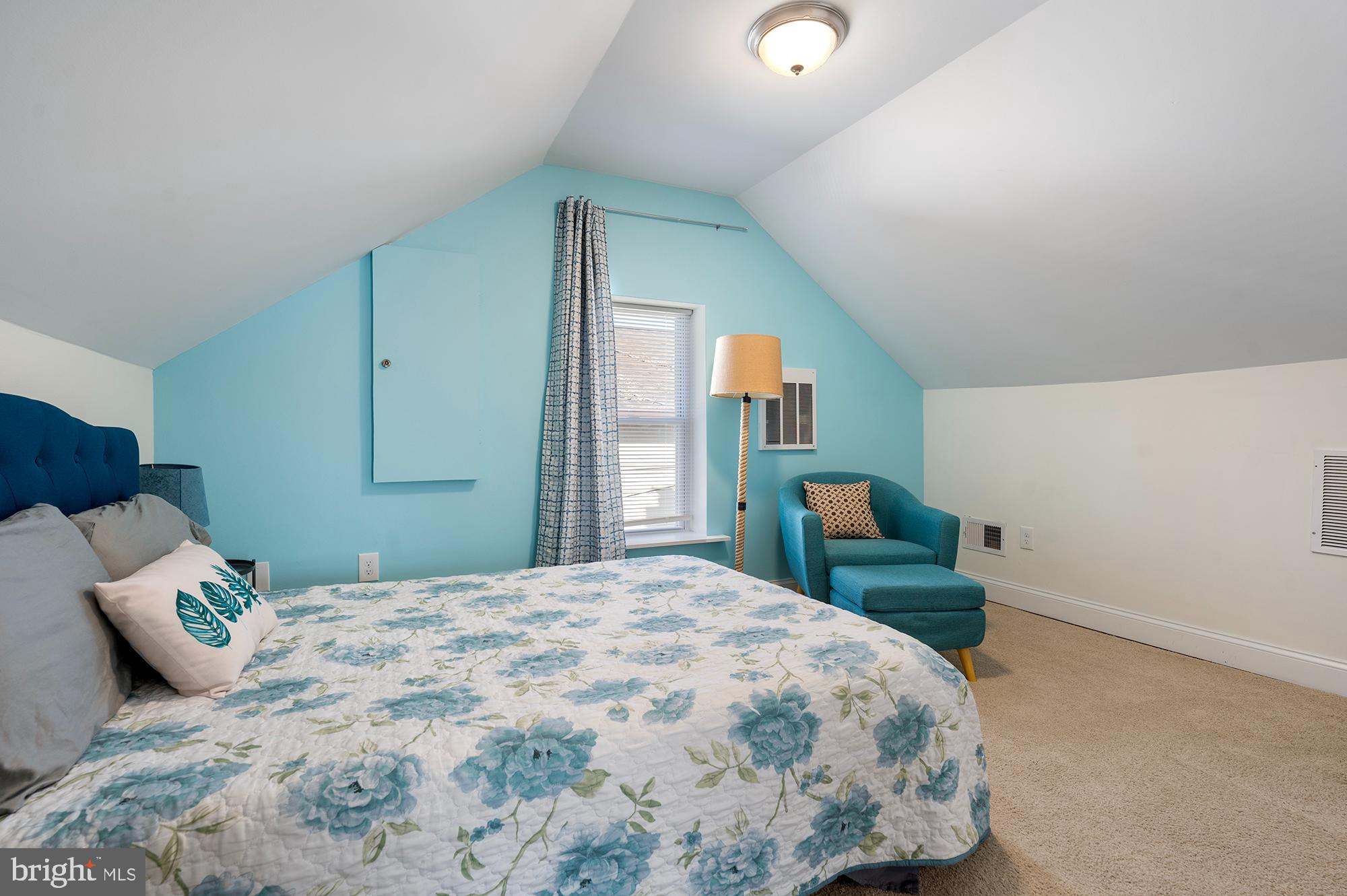 104 Wilson Boulevard Southwest Glen Burnie, MD 21061 - Photo 15 of 23 a bedroom with a bed and a dresser